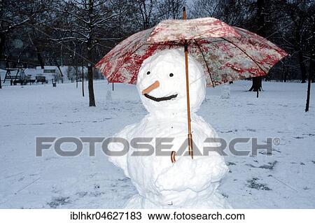 Snowman with umbrella, Berlin, Germany, Europe View Large Photo Image Stock Image - Snowman with umbrella, Berlin, Germany, Europe. Fotosearch