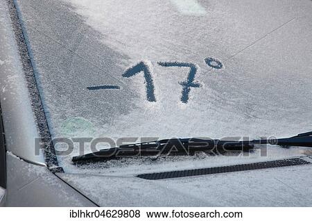 Snowy car windshield with the temperature number -17°, Germany, Europe View Large Photo Image Stock Photo - Snowy car windshield with the temperature number -17°, Germany, Europe. Fotosearch
