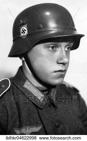 Stock Photo - Soldier of the Wehrmacht, boy, looking lost, ca. 1941, exact place unknown, Germany, Europe. Fotosearch