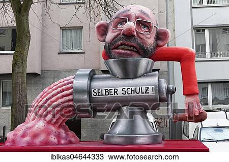 SPD former party leader Martin Schulz turns himself through the meat grinder, political cartoon, motto caravan during Carnival Monday procession 2018, Düsseldorf, North Rhine-Westphalia, Germany, Europe View Large Photo Image Stock Image - SPD former party leader Martin Schulz turns himself through the meat grinder, political cartoon, motto caravan during Carnival Monday procession 2018, Düsseldorf, North Rhine-Westphalia, Germany, Europe. Fotosearch