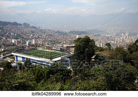 Sports ground overlooking city center, Comuna 8, Medellin, Antioquia Department, Colombia, South America View Large Photo Image Stock Photograph - Sports ground overlooking city center, Comuna 8, Medellin, Antioquia Department, Colombia, South America. Fotosearch