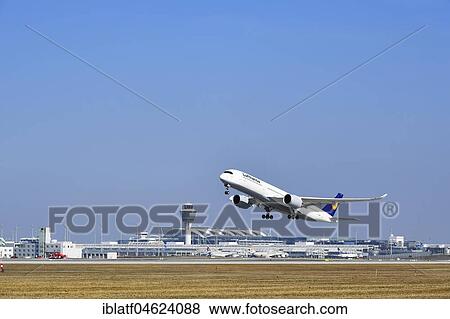 Stock Photo - Start, departure, Lufthansa Airbus A350-900, Runway South, Munich Airport, Upper Bavaria, Germany, Europe. Fotosearch