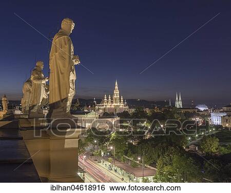 Statues of famous scientists on the roof of the Natural History Museum at night, view of Parliament and the City Hall, Vienna, Austria, Europe View Large Photo Image Stock Photograph - Statues of famous scientists on the roof of the Natural History Museum at night, view of Parliament and the City Hall, Vienna, Austria, Europe. Fotosearch