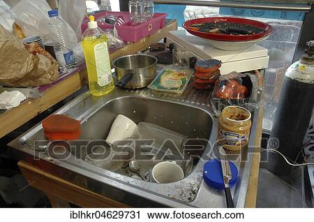 Stock Image - Still life on a kitchen sink, Chaos, Berlin, Germany, Europe. Fotosearch