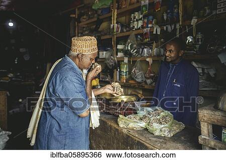 Sultan Abdullah, village elder from Madar Moge in a shop selling incense from his area, Erigavo, Sanaag, Somaliland View Large Photo Image Stock Photograph - Sultan Abdullah, village elder from Madar Moge in a shop selling incense from his area, Erigavo, Sanaag, Somaliland. Fotosearch