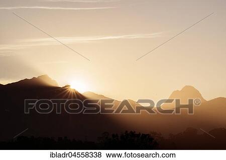 Sunset behind mountains, Wilderness, Garden Route, South Africa, Africa View Large Photo Image Stock Photo - Sunset behind mountains, Wilderness, Garden Route, South Africa, Africa. Fotosearch