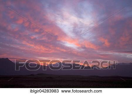 Stock Image - Sunset over the mountains, Snaefellsnes peninsula, Iceland, Europe. Fotosearch