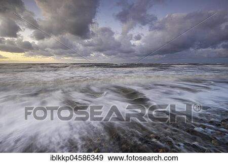 Stock Photo - Surf at the Baltic Sea coast near Bakenberg, Rügen, Mecklenburg-Western Pomerania, Germany, Europe. Fotosearch