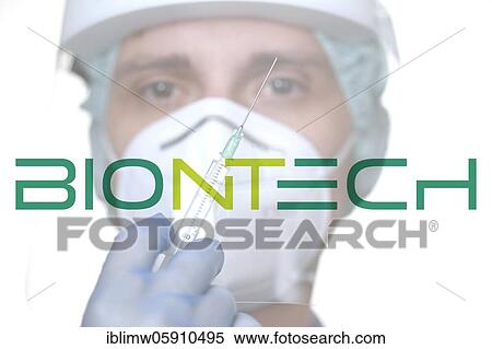 Symbol image Corona vaccine from BIONTECH, man with syringe, corona crisis, Baden-Württemberg, Germany, Europe View Large Photo Image Stock Photography - Symbol image Corona vaccine from BIONTECH, man with syringe, corona crisis, Baden-Württemberg, Germany, Europe. Fotosearch