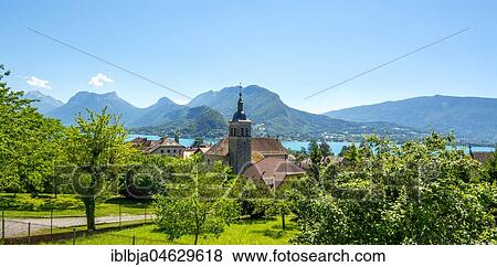 Stock Photo - Talloires village, Annecy Lake and Massif of Bauges, Haute Savoie departement, Auvergne-Rhône-Alpes, France, Europe. Fotosearch