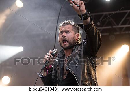Stock Image - The American rock band Rival Sons live at the 27th Heitere Open Air in Zofingen, Aargau, Switzerland Jay Buchanan, vocals Scott Holiday, guitar Dave Beste, bass. Fotosearch