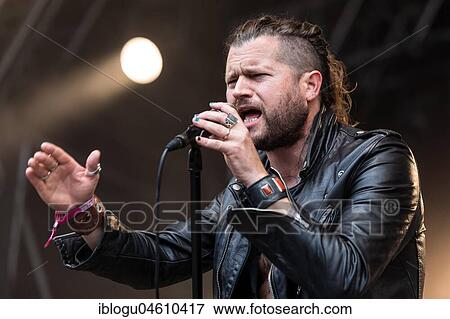 The American rock band Rival Sons live at the 27th Heitere Open Air in Zofingen, Aargau, Switzerland Jay Buchanan, vocals Scott Holiday, guitar Dave Beste, bass View Large Photo Image Stock Photo - The American rock band Rival Sons live at the 27th Heitere Open Air in Zofingen, Aargau, Switzerland Jay Buchanan, vocals Scott Holiday, guitar Dave Beste, bass. Fotosearch