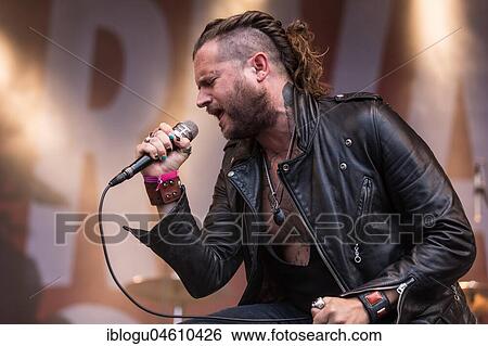 The American rock band Rival Sons live at the 27th Heitere Open Air in Zofingen, Aargau, Switzerland Jay Buchanan, vocals Scott Holiday, guitar Dave Beste, bass View Large Photo Image Stock Photograph - The American rock band Rival Sons live at the 27th Heitere Open Air in Zofingen, Aargau, Switzerland Jay Buchanan, vocals Scott Holiday, guitar Dave Beste, bass. Fotosearch
