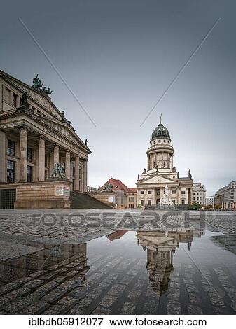 Stock Photo - The Gendarmenmarkt with the French Cathedral and the concert hall in Berlin Mitte, Berlin 2020. Fotosearch