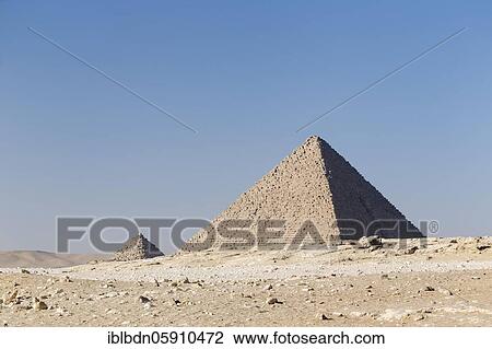 Stock Image - The pyramid of Menkaure next to the queen's pyramids, Giza, Egypt, Africa. Fotosearch