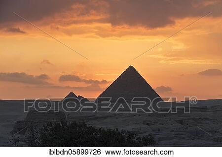 Stock Photograph - The pyramids of Menkaure at sunset, Giza, Egypt, Africa. Fotosearch