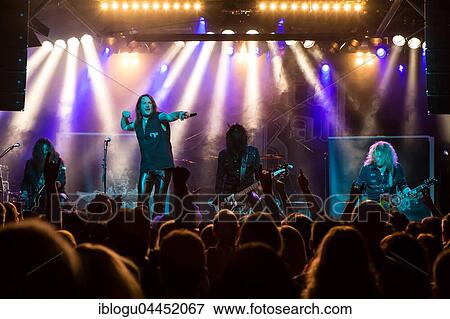 Stock Photo - The Swiss hard rock band Crystal Ball live in the Schüür Luzern, Switzerland Steven Mageney, vocals Scott Leach, guitar Tony Castell, guitar Marcel Sardella, drums Cris Stone, bass. Fotosearch