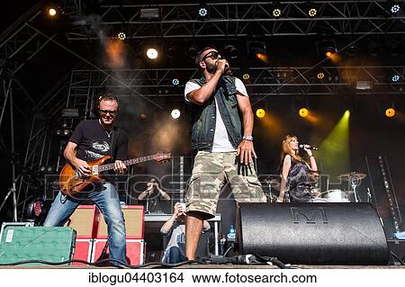 The swiss rapper and musician Marco Bliggensdorfer alias Bligg live at the 26th Heitere Open Air in Zofingen, Aargau, Switzerland, Europe View Large Photo Image Picture - The swiss rapper and musician Marco Bliggensdorfer alias Bligg live at the 26th Heitere Open Air in Zofingen, Aargau, Switzerland, Europe. Fotosearch