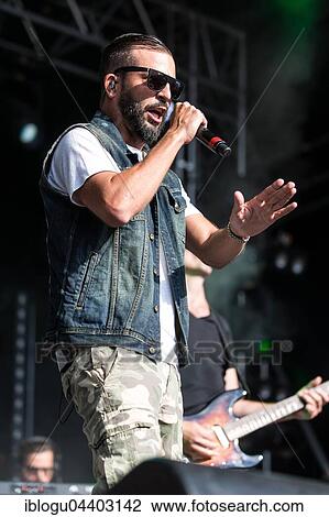 Stock Image - The swiss rapper and musician Marco Bliggensdorfer alias Bligg live at the 26th Heitere Open Air in Zofingen, Aargau, Switzerland, Europe. Fotosearch