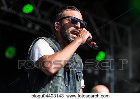 The swiss rapper and musician Marco Bliggensdorfer alias Bligg live at the 26th Heitere Open Air in Zofingen, Aargau, Switzerland, Europe View Large Photo Image Stock Image - The swiss rapper and musician Marco Bliggensdorfer alias Bligg live at the 26th Heitere Open Air in Zofingen, Aargau, Switzerland, Europe. Fotosearch
