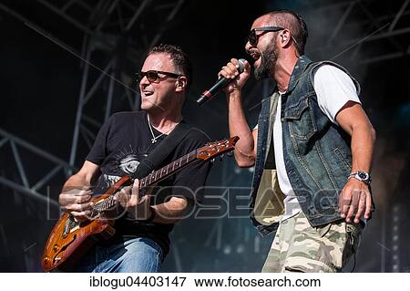 The swiss rapper and musician Marco Bliggensdorfer alias Bligg live at the 26th Heitere Open Air in Zofingen, Aargau, Switzerland, Europe View Large Photo Image Stock Photo - The swiss rapper and musician Marco Bliggensdorfer alias Bligg live at the 26th Heitere Open Air in Zofingen, Aargau, Switzerland, Europe. Fotosearch