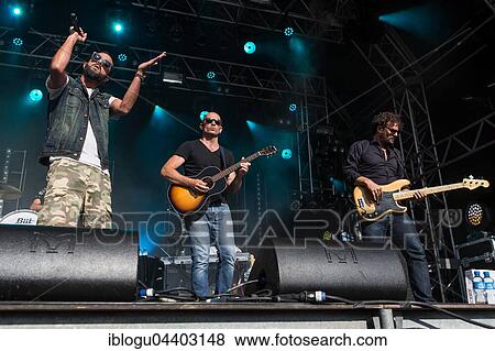Stock Photo - The swiss rapper and musician Marco Bliggensdorfer alias Bligg live at the 26th Heitere Open Air in Zofingen, Aargau, Switzerland, Europe. Fotosearch