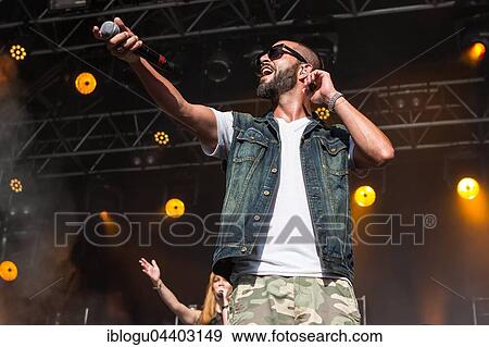 The swiss rapper and musician Marco Bliggensdorfer alias Bligg live at the 26th Heitere Open Air in Zofingen, Aargau, Switzerland, Europe View Large Photo Image Stock Photo - The swiss rapper and musician Marco Bliggensdorfer alias Bligg live at the 26th Heitere Open Air in Zofingen, Aargau, Switzerland, Europe. Fotosearch