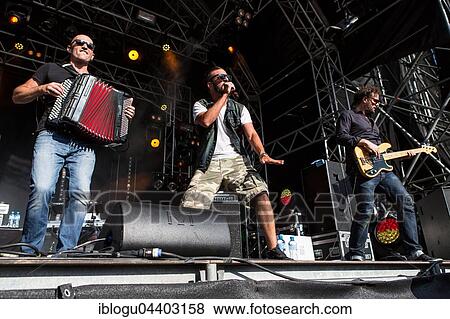 The swiss rapper and musician Marco Bliggensdorfer alias Bligg live at the 26th Heitere Open Air in Zofingen, Aargau, Switzerland, Europe View Large Photo Image Stock Photo - The swiss rapper and musician Marco Bliggensdorfer alias Bligg live at the 26th Heitere Open Air in Zofingen, Aargau, Switzerland, Europe. Fotosearch