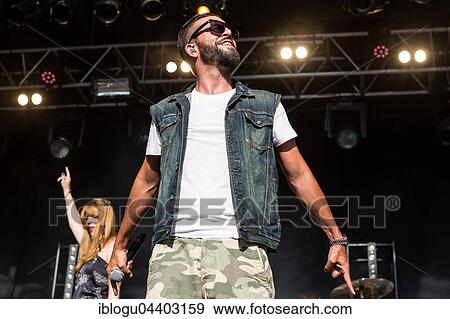 The swiss rapper and musician Marco Bliggensdorfer alias Bligg live at the 26th Heitere Open Air in Zofingen, Aargau, Switzerland, Europe View Large Photo Image Stock Photo - The swiss rapper and musician Marco Bliggensdorfer alias Bligg live at the 26th Heitere Open Air in Zofingen, Aargau, Switzerland, Europe. Fotosearch