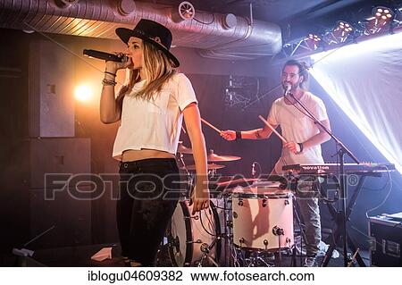The Swiss sibling duo Coco and Stee Gfeller alias Zibbz live at Schüür Luzern, Switzerland, Europe View Large Photo Image Stock Image - The Swiss sibling duo Coco and Stee Gfeller alias Zibbz live at Schüür Luzern, Switzerland, Europe. Fotosearch