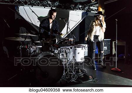 The Swiss sibling duo Coco and Stee Gfeller alias Zibbz live in the Schüür Lucerne, Switzerland, Europe View Large Photo Image Stock Photo - The Swiss sibling duo Coco and Stee Gfeller alias Zibbz live in the Schüür Lucerne, Switzerland, Europe. Fotosearch