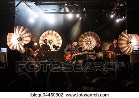 The Swiss singer and songwriter Lukas Linder alias Henrik Belden with band at the record baptism live in the Schüür Lucerne, Switzerland, Europe View Large Photo Image Stock Image - The Swiss singer and songwriter Lukas Linder alias Henrik Belden with band at the record baptism live in the Schüür Lucerne, Switzerland, Europe. Fotosearch