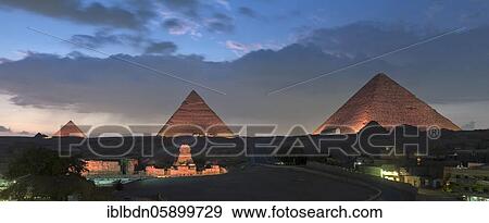 Stock Photo - The three main pyramids and sphinx during sound and light show, Giza, Egypt, Africa. Fotosearch