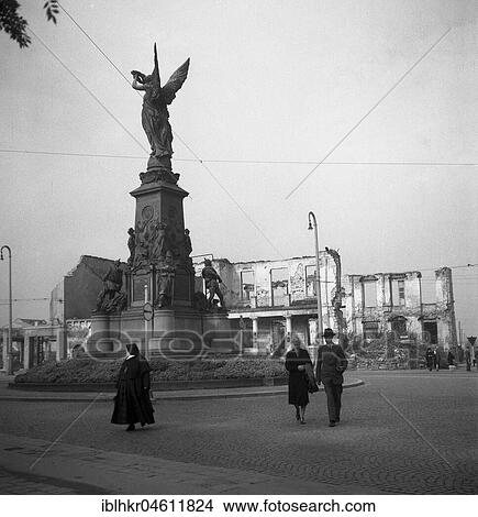 The Victory Monument at the end of Kaiser-Joseph-Straße in Freiburg, destroyed buildings in the background, ca. 1945, Freiburg, Germany, Europe View Large Photo Image Picture - The Victory Monument at the end of Kaiser-Joseph-Straße in Freiburg, destroyed buildings in the background, ca. 1945, Freiburg, Germany, Europe. Fotosearch