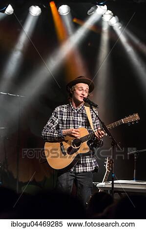 Stock Photography - The young Swiss musician Nicola Kneringer alias Nickless live at the Schüür Lucerne, Switzerland, Europe. Fotosearch