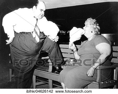 Thick couple eating cotton candy, ca. 1950, exact place unknown, Cuba, Caribbean, Central America View Large Photo Image Stock Image - Thick couple eating cotton candy, ca. 1950, exact place unknown, Cuba, Caribbean, Central America. Fotosearch