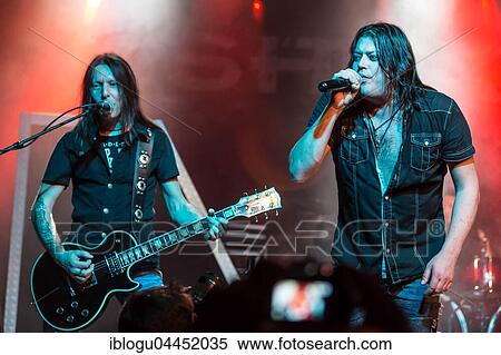 Thom Blunier, guitarist and Mark Fox, singer of the Swiss hard rock band Shakra live in the Schüür Lucerne, Switzerland, Europe View Large Photo Image Stock Photography - Thom Blunier, guitarist and Mark Fox, singer of the Swiss hard rock band Shakra live in the Schüür Lucerne, Switzerland, Europe. Fotosearch