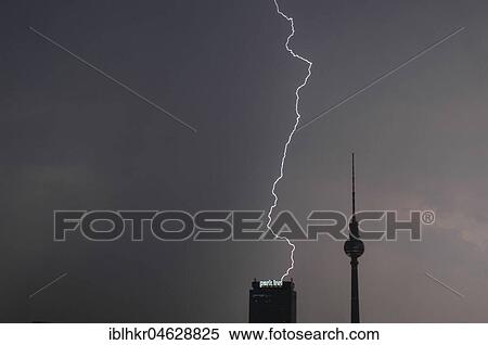 Stock Photography - Thunderstorm, lightning, TV tower, hotel, Park Inn, thunderstorm over Berlin, Germany, Europe. Fotosearch