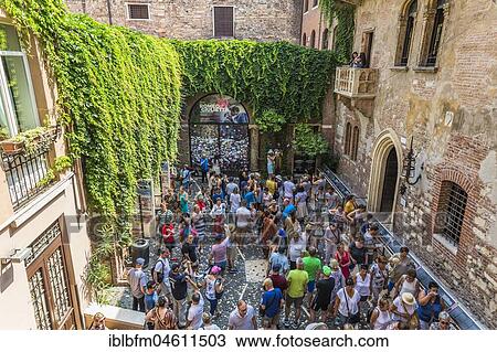 Tourists in the courtyard, House of Julia, Casa di Giulieta, Via Cappello, Verona, Veneto, Italy, Europe View Large Photo Image Stock Image - Tourists in the courtyard, House of Julia, Casa di Giulieta, Via Cappello, Verona, Veneto, Italy, Europe. Fotosearch