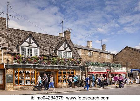 Tourists on High Street at Bourton-on-the-Water, Gloucestershire, England, United Kingdom, Europe View Large Photo Image Stock Photo - Tourists on High Street at Bourton-on-the-Water, Gloucestershire, England, United Kingdom, Europe. Fotosearch