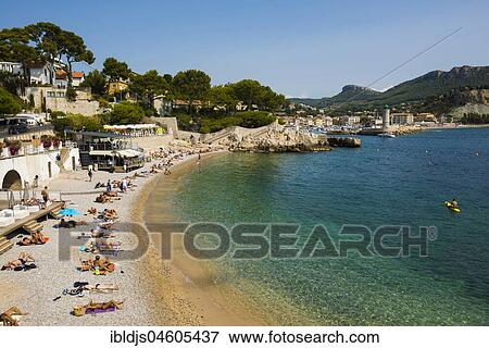 Stock Photo - Tourists on the beach, Plage Le Bestouan, Cassis, Bouches-du-Rhone, Provence-Alpes-Côte d' Azur, South of France, France, Europe. Fotosearch