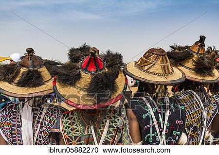 Stock Image - Traditional dressed Peul men, Gerewol festival, courtship ritual competition among the Woodaabe Fula people, Niger, Africa. Fotosearch