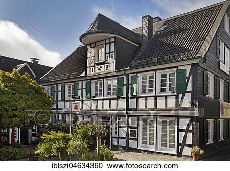 Stock Image - Traditional half-timbered house, Restaurant Bergischer Löwe, Wermelskirchen, Bergisches Land, North Rhine-Westphalia, Germany, Europe. Fotosearch