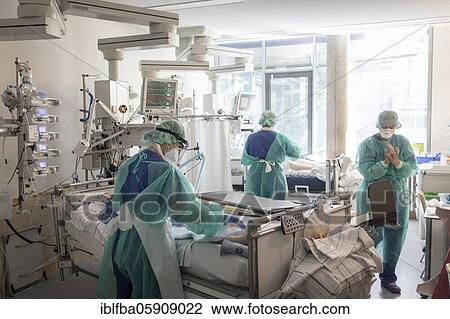 Stock Image - Treatment of a patient in intensive care unit for Covid patients, Agatharied Hospital, Agatharied, Bavaria, Germany, Europe. Fotosearch