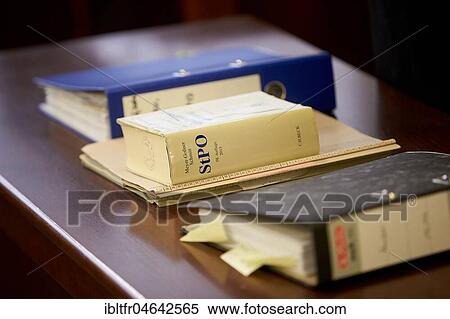 Trial files and Criminal Procedure Code StPO on the table in the courtroom, Koblenz District Court, Rhineland-Palatinate, Germany, Europe View Large Photo Image Stock Photography - Trial files and Criminal Procedure Code StPO on the table in the courtroom, Koblenz District Court, Rhineland-Palatinate, Germany, Europe. Fotosearch