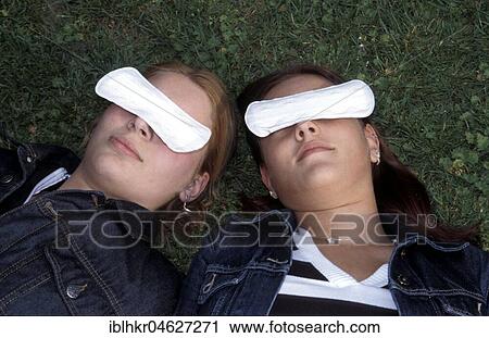 Two women with slips over the eyes, Berlin, Germany, Europe View Large Photo Image Stock Image - Two women with slips over the eyes, Berlin, Germany, Europe. Fotosearch