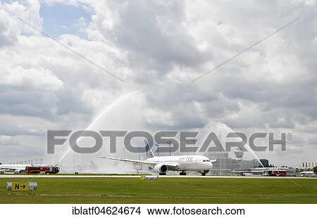 Picture - United Airlines, Boeing, B787-900, Dreamliner, maiden flight, baptism of water, Munich Airport, Upper Bavaria, Germany, Europe. Fotosearch