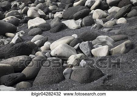 Stock Image - Various stones, volcanic rock on beach, Vik, Iceland, Europe. Fotosearch