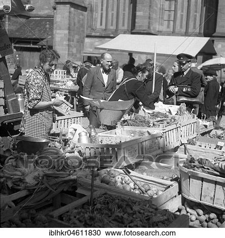 Vegetable sales, Freiburger Münstermarkt, around 1950, Freiburg, Germany, Europe View Large Photo Image Stock Image - Vegetable sales, Freiburger Münstermarkt, around 1950, Freiburg, Germany, Europe. Fotosearch