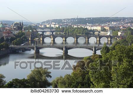 View from Letna Hill over the Vltava River bridges to the historic centre with bridge tower, Prague, Czech Republic, Europe View Large Photo Image Stock Image - View from Letna Hill over the Vltava River bridges to the historic centre with bridge tower, Prague, Czech Republic, Europe. Fotosearch